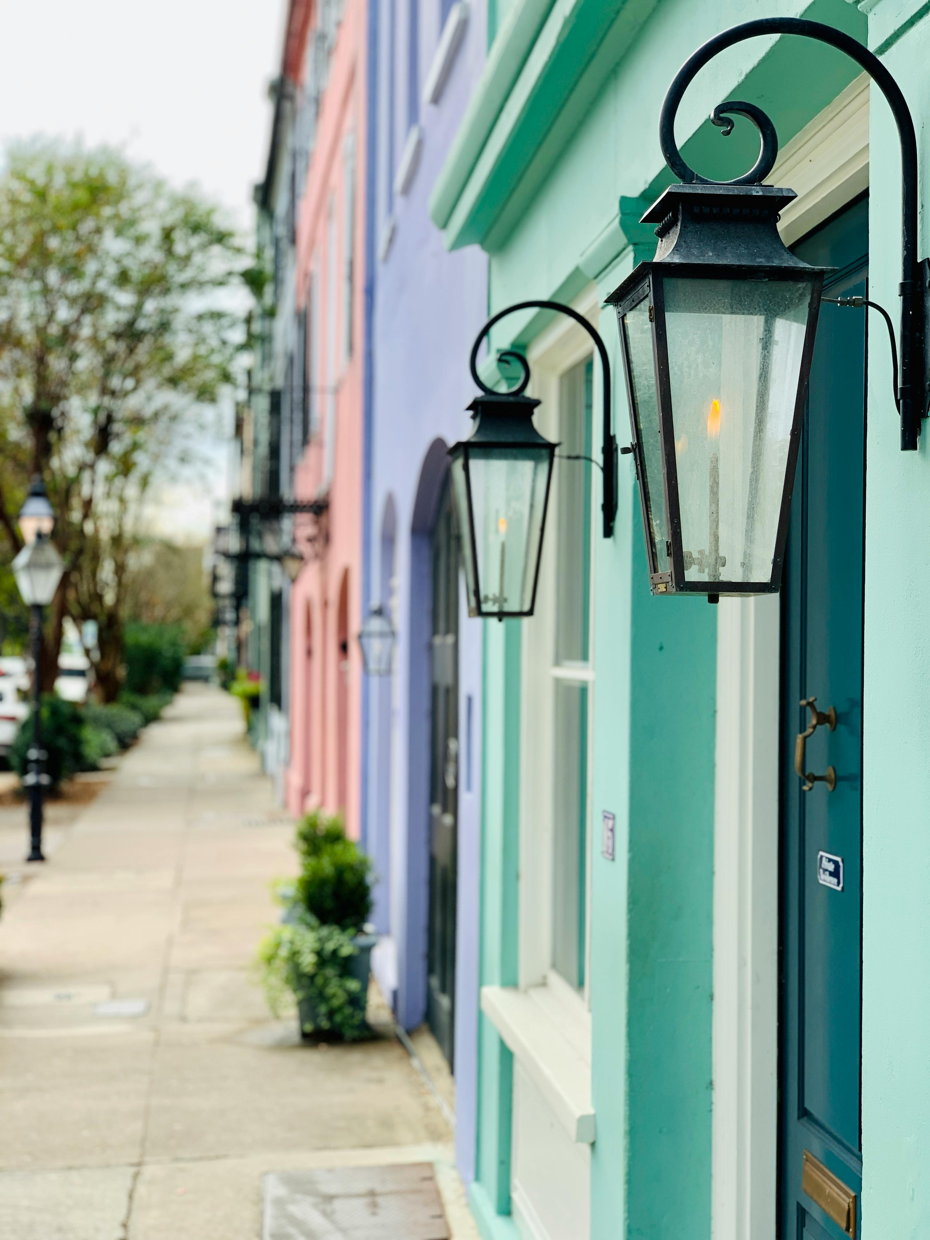 Charleston's historic district — pastel single houses with piazzas and palmettos that define the city's signature streetscape.