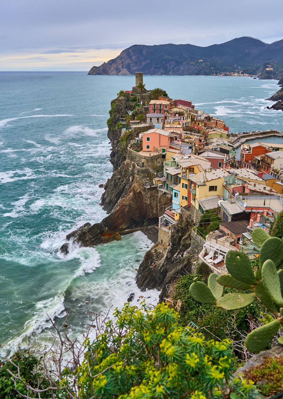 Cinque Terre's painted cliffside village above the Ligurian Sea — the format that all five villages share.